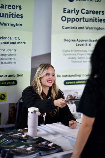 A graduate at a Sellafield early careers exhibition stand