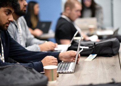 Students taking part in a workshop session